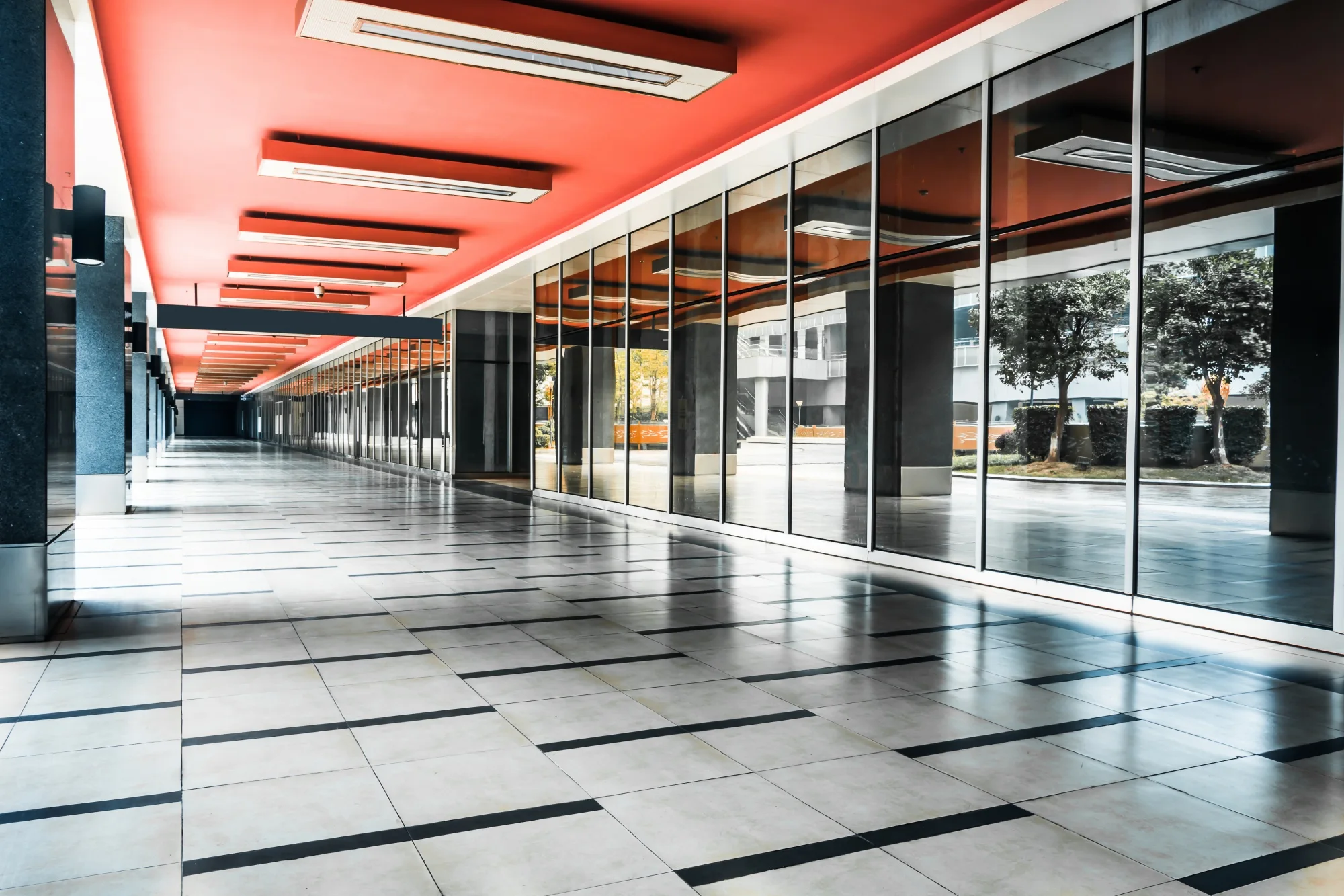 Modern commercial building with a broad glass façade